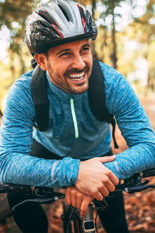 Alpha-2-Macroglobulin-A2M-Therapy-Treatment A man happily beginning a cycling trek. Get Alpha-2-Macroglobulin (A2M) Therapy from Stephen Beyer, DC in Mokena.