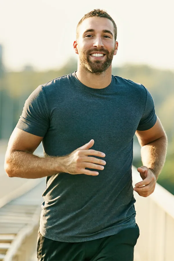 PRP-for-Joint-Pain-Treatment A man happily running for exercise. Get PRP for joint pain from Stephen Beyer, DC in Mokena.